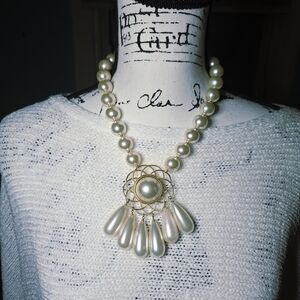 Elegant Pearl Necklace with Gold Accents
